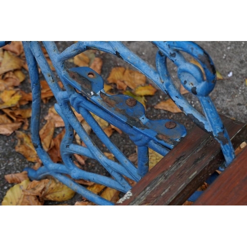 1074 - A blue painted cast iron garden bench. This lot can only be collected on Saturday 19th December (9-2... 