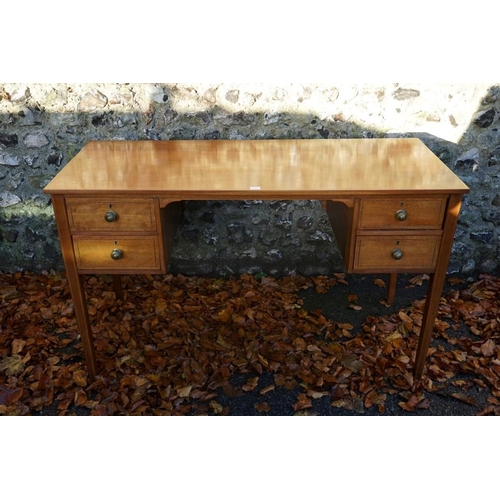 1079 - An Edwardian inlaid mahogany kneehole desk, (alterations), 130cm wide x 54.5cm deep x 76cm high.This... 