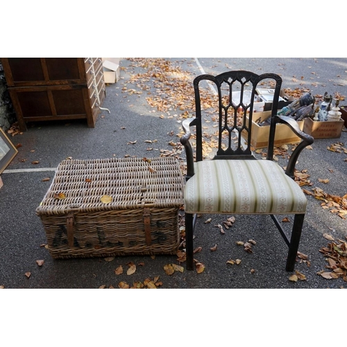 1086 - A Georgian mahogany gothic open armchair; together with a wicker laundry basket a bamboo table and a... 