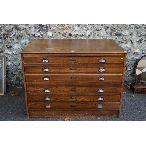 1092 - (THH) A vintage oak plan chest having six drawers.This lot can only be collected on Saturday 19th De... 