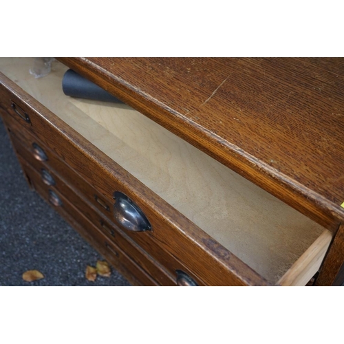 1092 - (THH) A vintage oak plan chest having six drawers.This lot can only be collected on Saturday 19th De... 