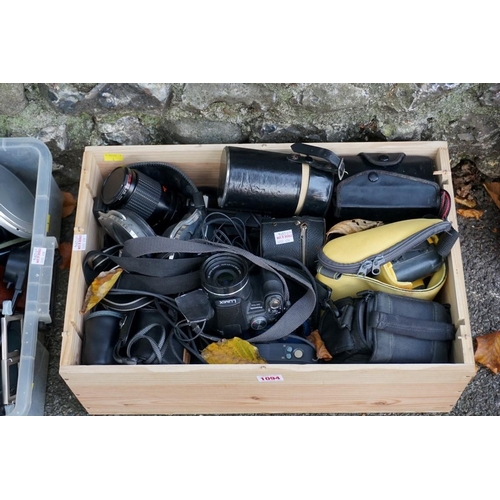 1094 - A large quantity of cameras and equipment; to include Lumix and Canon examples.This lot can only be ... 