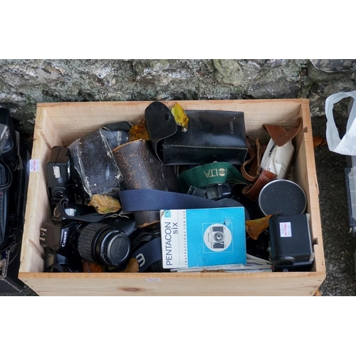 1094 - A large quantity of cameras and equipment; to include Lumix and Canon examples.This lot can only be ... 