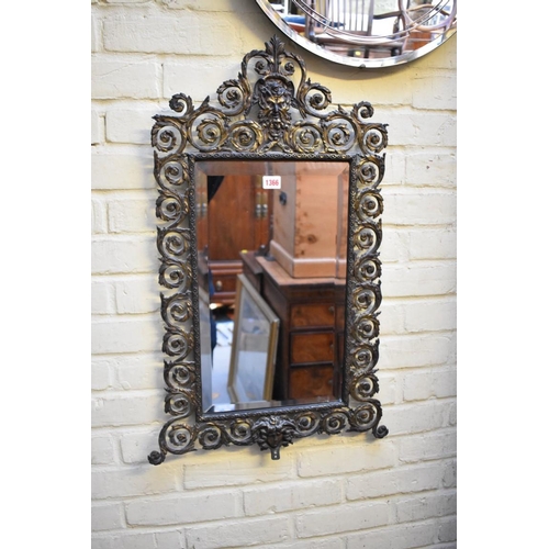 1366 - (THH) A cast brass framed wall mirror, 80.5 x 50cm.