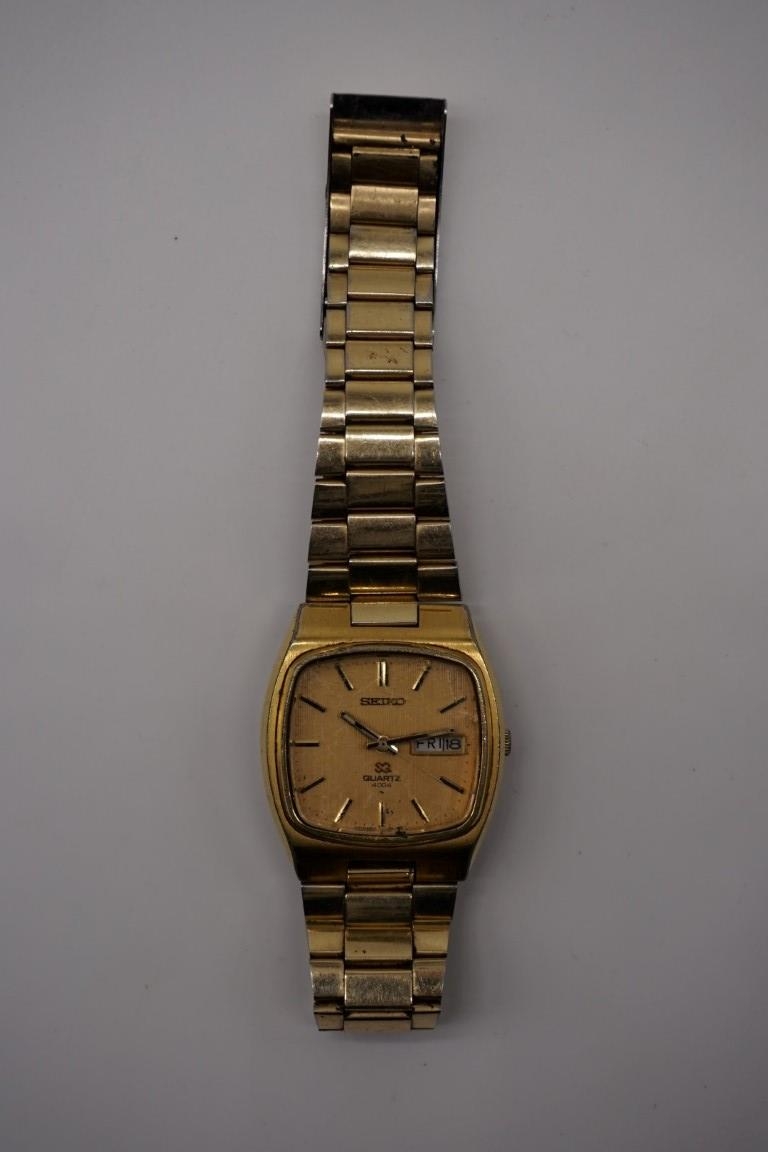 A 1970s Seiko SQ 4004 gold plated quartz day date wristwatch, 35mm.