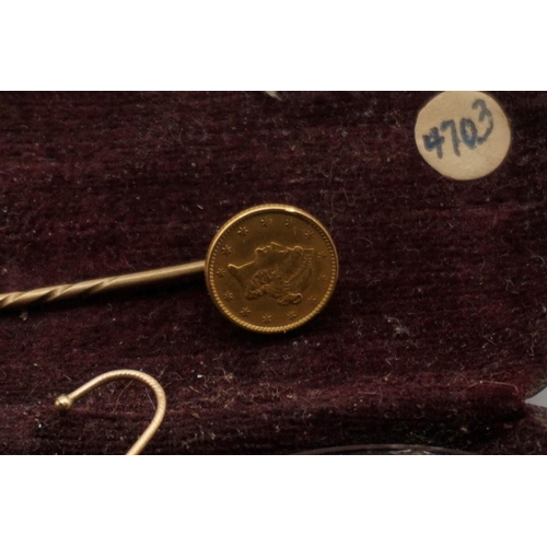 292 - Coins: a US Liberty head 1849-89 gold $1, mounted on a base metal cravat pin; together with a cased ... 