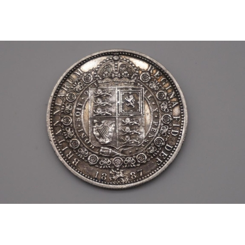 295 - Coins: a Victoria 1887 half crown.