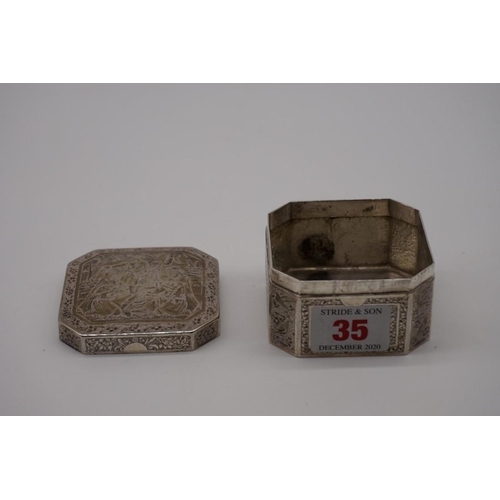 35 - An Indian white metal octagonal trinket box, 6.5cm.