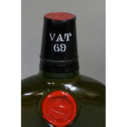 693 - An old half bottle of VAT 69 blended whisky, probably 1960s bottling, in card box.... 