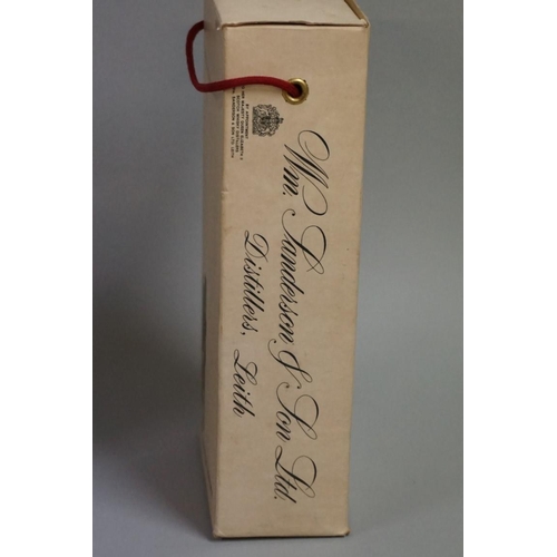 693 - An old half bottle of VAT 69 blended whisky, probably 1960s bottling, in card box.... 