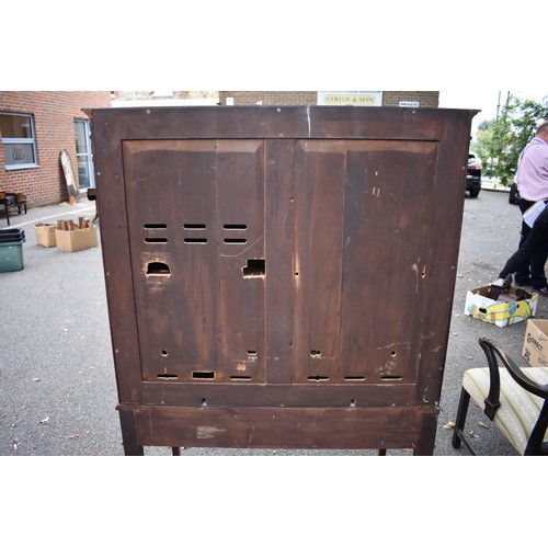 1077 - An antique mahogany cupboard having pair of doors and two small drawers, 101cm wide, (converted to m... 