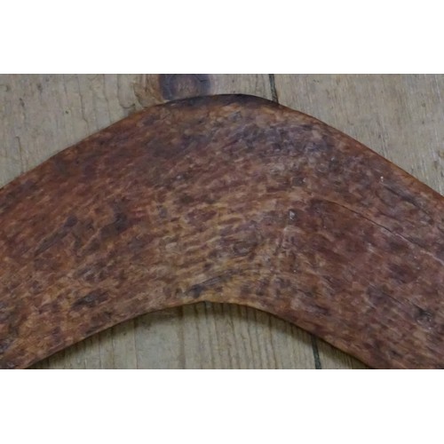 1930 - Ethnographica: an Australian boomerang, 64.5cm wide. 