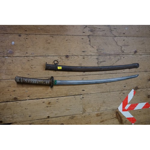 1928 - An Imperial Japanese Army World War II Type 95 NCO's Shin Gunto sword and scabbard, blade numbered 1... 