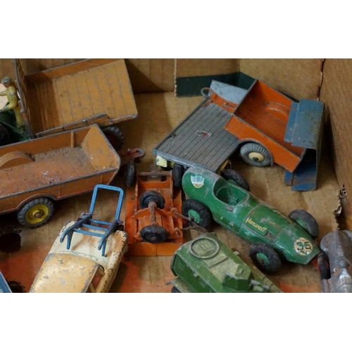 560 - A large collection of vintage Dinky and Corgi diecast vehicles, (all playworn). (qty)... 