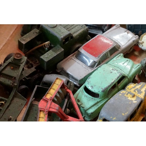 560 - A large collection of vintage Dinky and Corgi diecast vehicles, (all playworn). (qty)... 