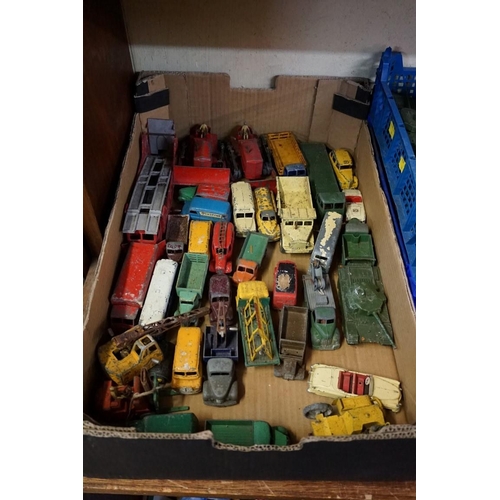 560 - A large collection of vintage Dinky and Corgi diecast vehicles, (all playworn). (qty)... 