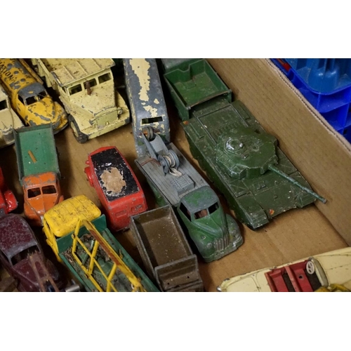 560 - A large collection of vintage Dinky and Corgi diecast vehicles, (all playworn). (qty)... 