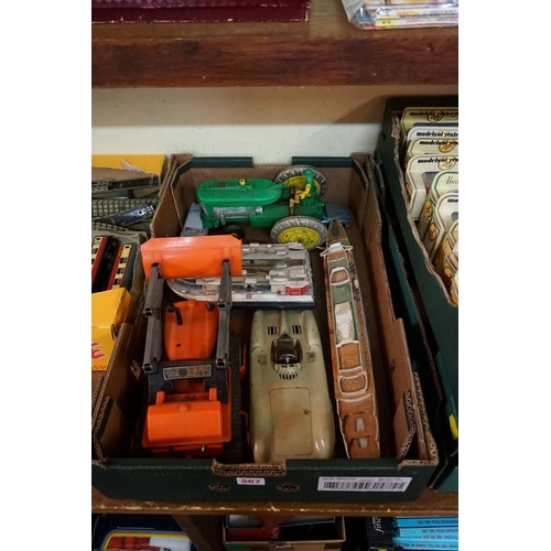 567 - A mixed group of vintage toys, comprising: a 'Made in Western Germany' tinplate 'Mercedes Benz W196'... 