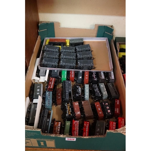 569 - A large collection of 'OO' gauge wagons. (61)