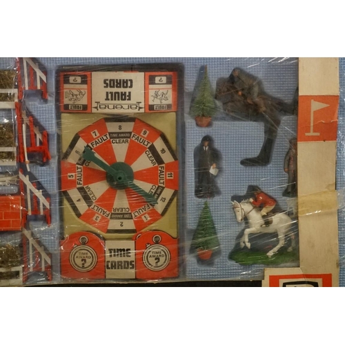 574 - Two vintage Britain's boxed equestrian sets, comprising: an 'Arena' show jumping set, No. 7580; and ... 