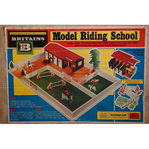 574 - Two vintage Britain's boxed equestrian sets, comprising: an 'Arena' show jumping set, No. 7580; and ... 