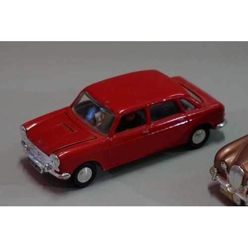 586 - Two Spot-On tinplate cars, comprising: 'Jaguar S-Type'; and 'Austin 1800'. (2)