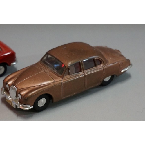 586 - Two Spot-On tinplate cars, comprising: 'Jaguar S-Type'; and 'Austin 1800'. (2)