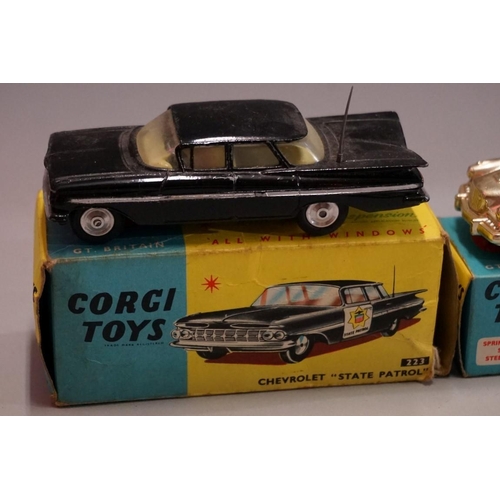 590 - Two Corgi American cars, comprising: 2115 'Studebaker Golden Hawk'; and 223 Chevrolet State Patrol',... 