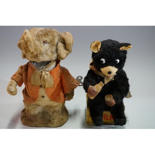 591 - Two vintage plush-covered clockwork animals, comprising: a circus elephant, 17cm high; and a novelty... 