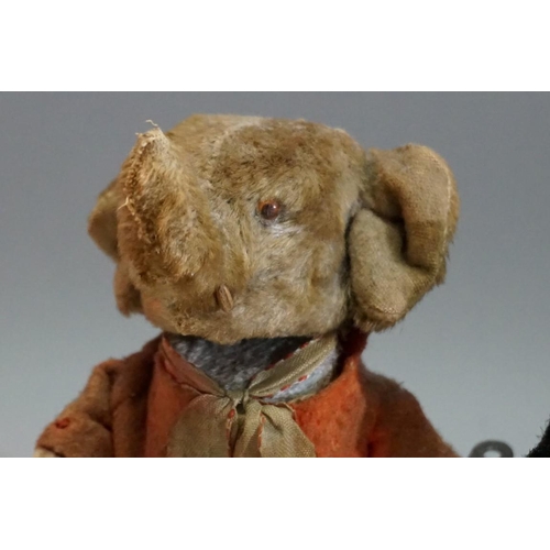 591 - Two vintage plush-covered clockwork animals, comprising: a circus elephant, 17cm high; and a novelty... 