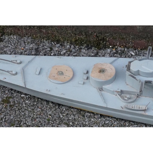 592 - A grey painted wood and metal model of a German Schlachtschiff or battleship, total length 115cm lon... 