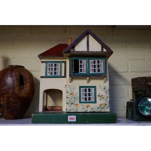 593 - A vintage Triang 'Dolls' House No 23', 42cm high.