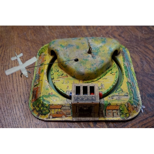 594 - A vintage Technofix 'Mountain Express' tinplate clockwork train set, to include one coach, (no key);... 