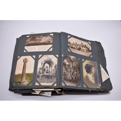 117 - POSTCARD ALBUM: substantial vintage album containing approx 465 postcards, many World War I period h... 