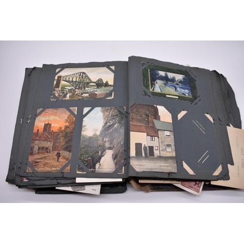 117 - POSTCARD ALBUM: substantial vintage album containing approx 465 postcards, many World War I period h... 