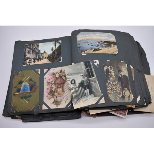 117 - POSTCARD ALBUM: substantial vintage album containing approx 465 postcards, many World War I period h... 