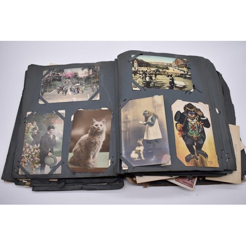 117 - POSTCARD ALBUM: substantial vintage album containing approx 465 postcards, many World War I period h... 