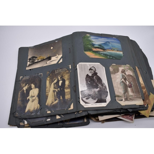 117 - POSTCARD ALBUM: substantial vintage album containing approx 465 postcards, many World War I period h... 