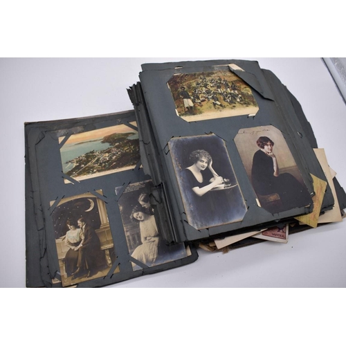 117 - POSTCARD ALBUM: substantial vintage album containing approx 465 postcards, many World War I period h... 