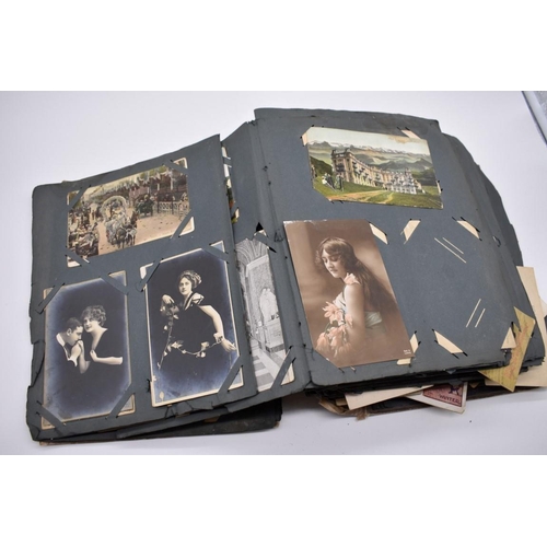 117 - POSTCARD ALBUM: substantial vintage album containing approx 465 postcards, many World War I period h... 