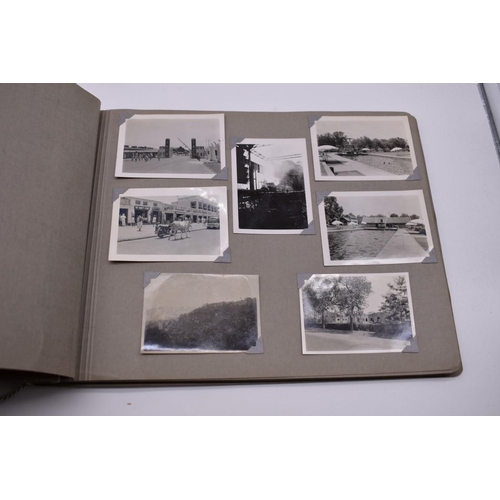 132 - PHOTOGRAPH ALBUMS: SINGAPORE: album of b&w snapshot photographs, family and military live Singap... 