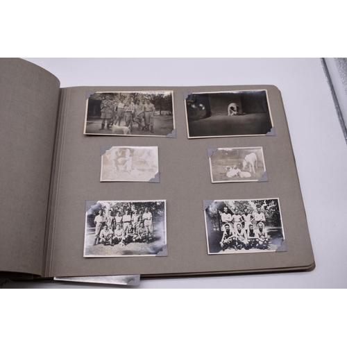 132 - PHOTOGRAPH ALBUMS: SINGAPORE: album of b&w snapshot photographs, family and military live Singap... 