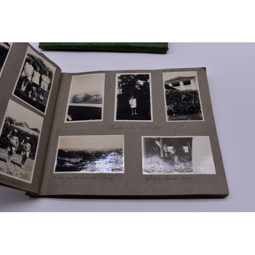 132 - PHOTOGRAPH ALBUMS: SINGAPORE: album of b&w snapshot photographs, family and military live Singap... 