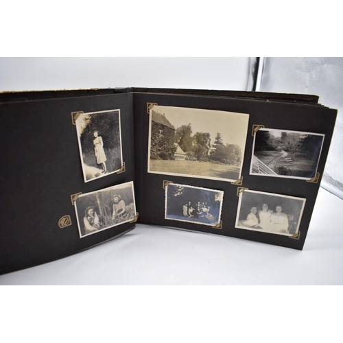 132 - PHOTOGRAPH ALBUMS: SINGAPORE: album of b&w snapshot photographs, family and military live Singap... 