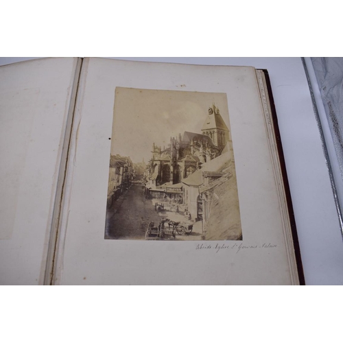 148 - PHOTOGRAPH ALBUMS: 2 folio albums, both worn with contents partially excised, numerous albumen ... 