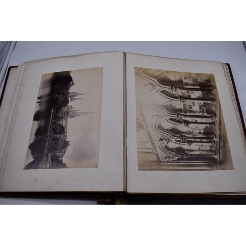 148 - PHOTOGRAPH ALBUMS: 2 folio albums, both worn with contents partially excised, numerous albumen ... 