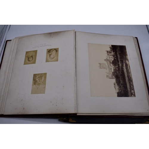 148 - PHOTOGRAPH ALBUMS: 2 folio albums, both worn with contents partially excised, numerous albumen ... 