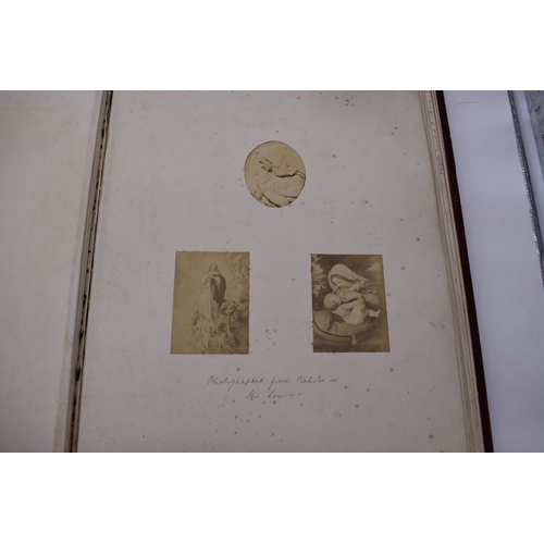 148 - PHOTOGRAPH ALBUMS: 2 folio albums, both worn with contents partially excised, numerous albumen ... 