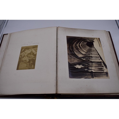 148 - PHOTOGRAPH ALBUMS: 2 folio albums, both worn with contents partially excised, numerous albumen ... 