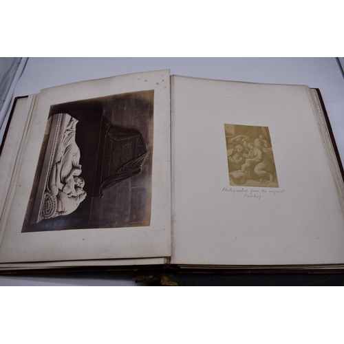 148 - PHOTOGRAPH ALBUMS: 2 folio albums, both worn with contents partially excised, numerous albumen ... 